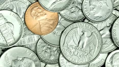 Video-4K-Pile-of-Golden-coin,-silver-coin,-copper-coin,-quarters,-nickels,-dimes,-pennies,-fifty-cent-piece-and-dollar-coinsTilt-up-VDO-of-Various-USA-coins,-American-coins-for-business,-money,-financial-and-economy-concept-background,-title,-end-credit.