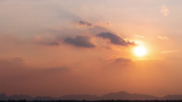 Time-lapse-nature-background.-Sunset-time-interval.-The-movement-of-clouds-and-Sun.