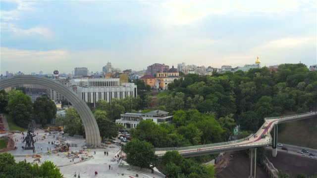 Aerial-view-of-the-Arch-of-Friendship-of-Peoples,-new-bicycle-and-pedestrian-bridge,-Parkovaya-Road,-Kiev