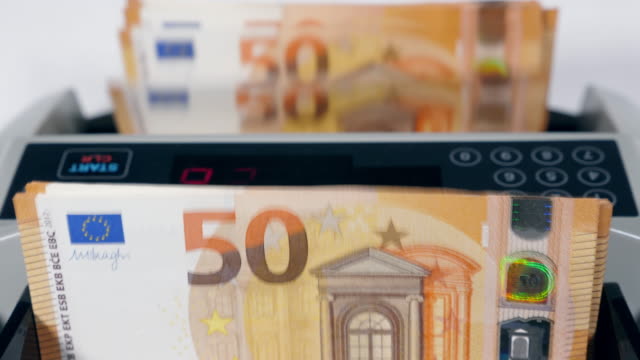 Calculating-device-is-processing-euro-banknotes