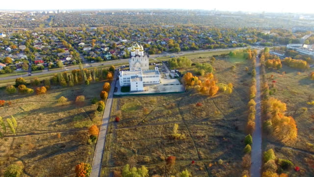 Aerial-view-to-Orthodox-church-in-park-in-Kharkiv,-Ukraine