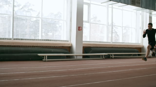 Sportsman-with-Prosthetic-Leg-Sprinting-on-Track