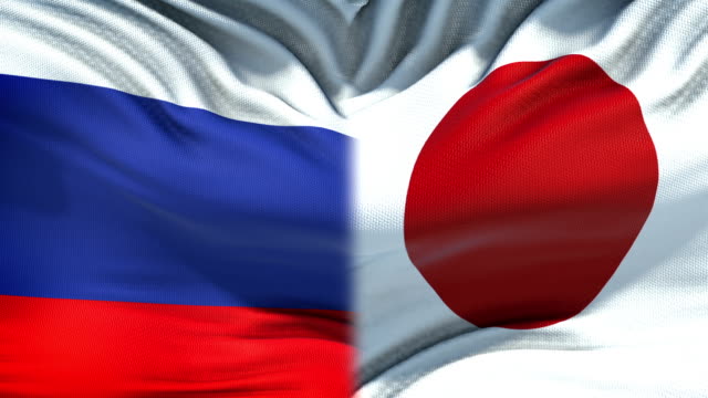 Fondo-banderas-de-Rusia-y-Japón,-las-relaciones-económicas-y-diplomáticas,-negocios