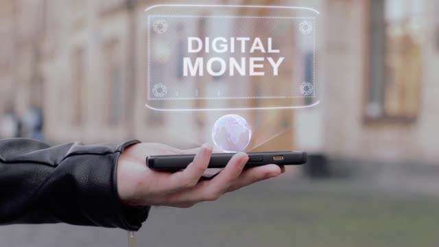 Männliche-Hände-zeigen-auf-Smartphone-konzeptionelle-HUD-Hologramm-Digital-Geld