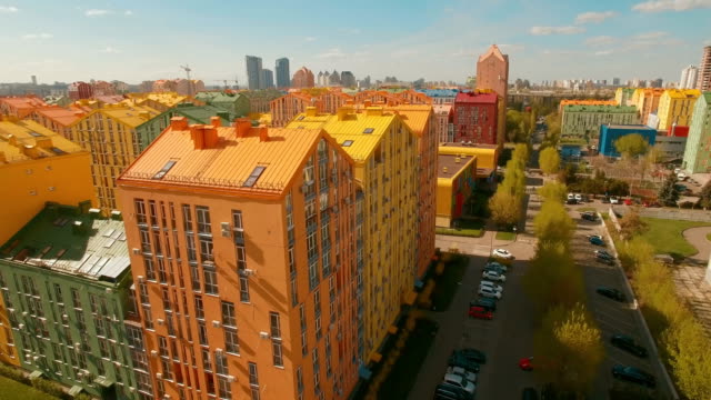 Panorama-cozy-comfortable-colorful-buildings-in-a-European-city-4K-UHD-aerial