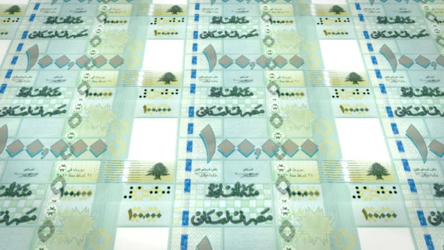 Billetes-de-100-mil-libras-libanesas-de-Líbano,-dinero-en-efectivo,-lazo