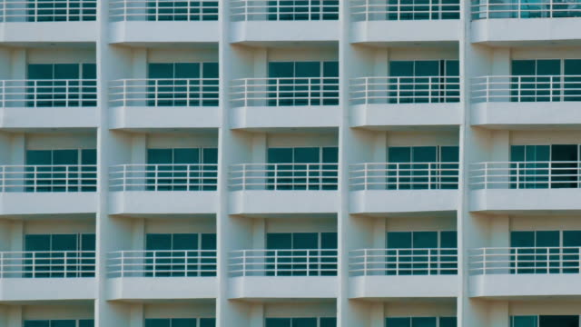Multi-storey-building-with-balconies-and-things-that-hang-there.-Multi-storey-building-close-up-view