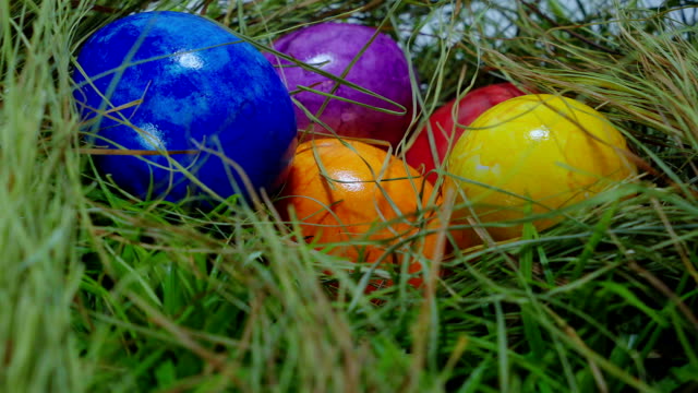 Sliding-over-a-nest-with-Easter-Eggs---close-up-shot