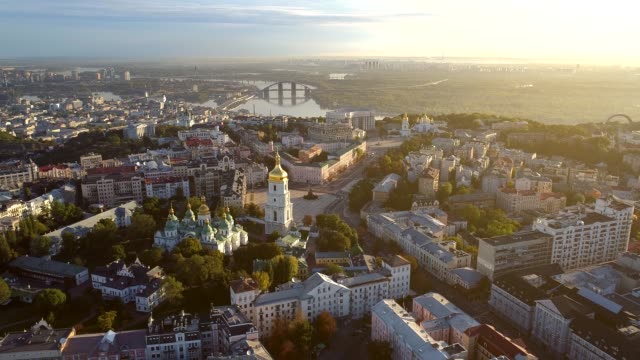 Kiev-city-center-in-morning-lights.-Dnipro-river-and-Sophia-Cathedral-of-Kiev,-Ukraine.-Aerial-drone-shot.-4K,-UHD