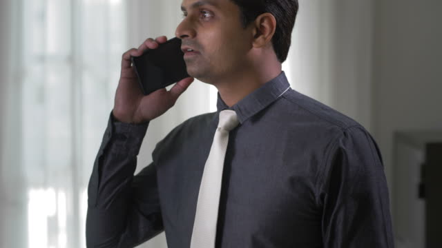 Businessman-Having-Important-Phone-Talk