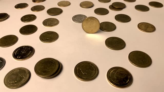 Coin-spin-in-slow-motion.