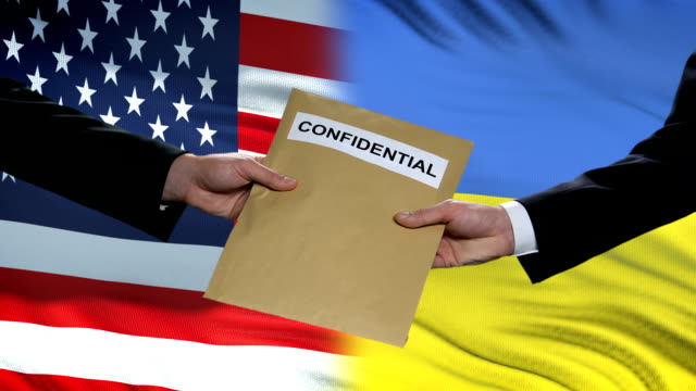 USA-and-Ukraine-officials-exchanging-confidential-envelope,-flags-background