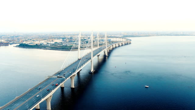 flycam-moves-above-long-cable-stayed-bridge-with-pylons