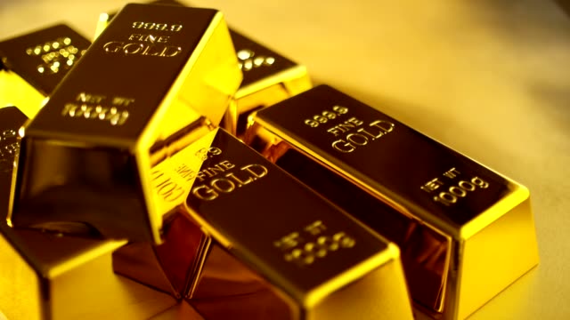 Stack-of-gold-bars.-Financial-concepts.