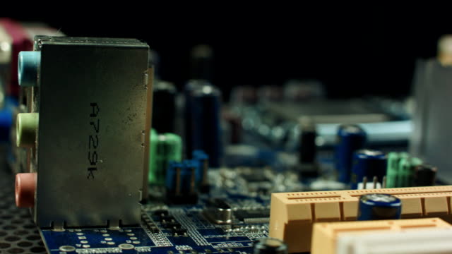 motherboard-with-CPU-spinning-on-a-black-background