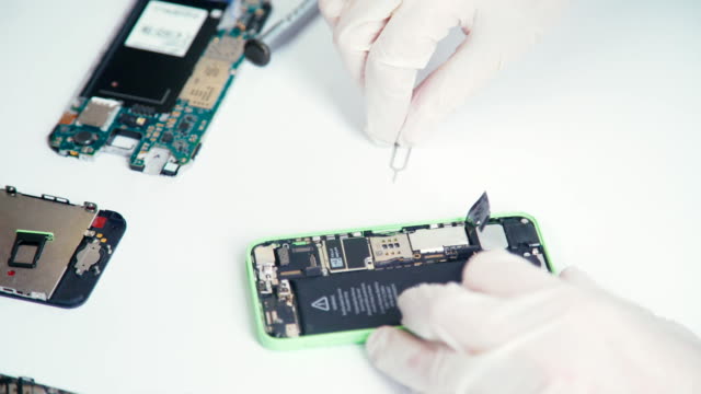 Chips-and-details-of-the-smartphone.-Disassembled-cell-phone-battery