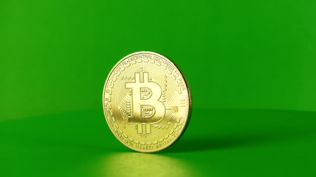 Weltweite-virtuelle-Internet-Kryptowährung-und-digitale-Zahlungssystem,-Goldmünze,-gedreht-auf-grün