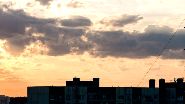 Roof-of-the-old-panel-houses-in-big-city-in-cloudy-sky-at-sunset