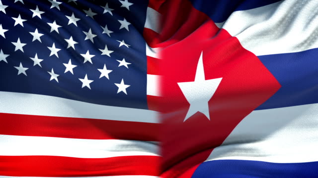 Fondo-de-banderas-de-Estados-Unidos-y-Cuba,-las-relaciones-diplomáticas-y-económicas