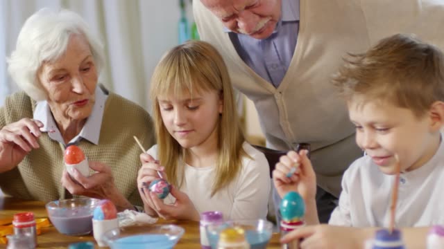 Grandchildren-and-Grandparents-Painting-Eggs-and-Talking