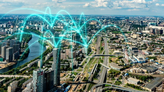 Aerial-city-connected-through-5G.-Wireless-network,-mobile-technology-concept,-data-communication,-cloud-computer,-artificial-intelligence,-internet-of-things.-Time-lapse-Moskau