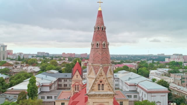 Aerial-view-of-the-cross-on-spire-of-Odessa-Lutheran-St.-Paul's-Cathedral,-German-Evangelical-Lutheran-Church-of-Ukraine