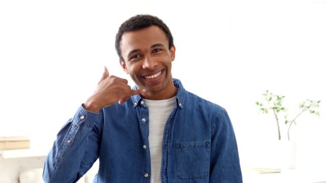 Call-Us,-Hand-Gesture-by-Afro-American-Man-Portrait