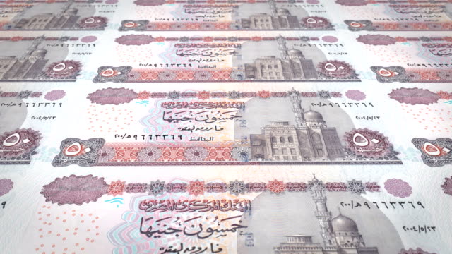 Banknotes-of-fifty-egyptian-pound-of-Egypt-rolling,-cash-money,-loop