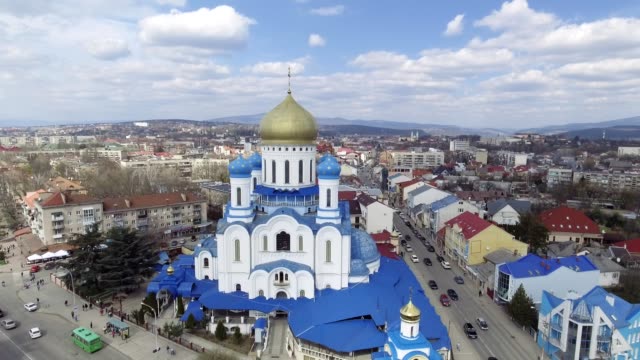 Aerial-footage-of-Uzhgorod-city-center---top-view-of-church-in-summer.-Day-time