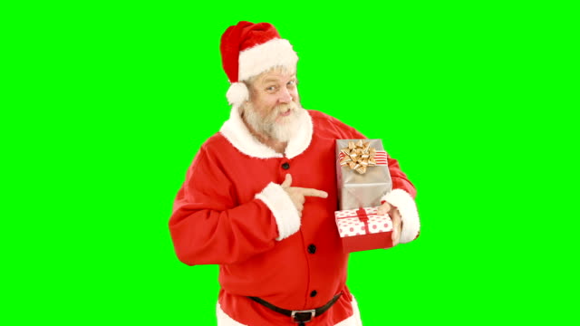 Santa-claus-holding-a-gift-box