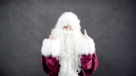 Matón-mal-Santa-Claus-muestra-el-dedo-medio