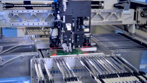 Automated-robotic-manufacturing-PCB,-modern-equipment.-4K.