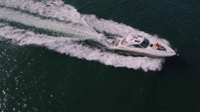 Drone-shot-of-yacht-sailing-in-the-ocean