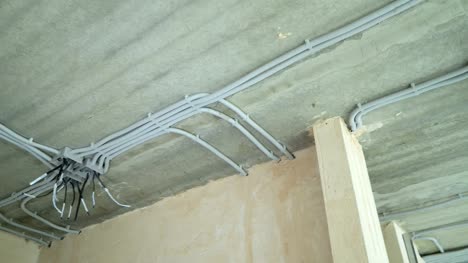 Electrical-installation-of-plastic-electrification-tubes-on-building-site