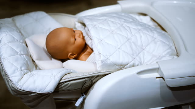 Bed-with-automatic-swing.-Bed-for-babies