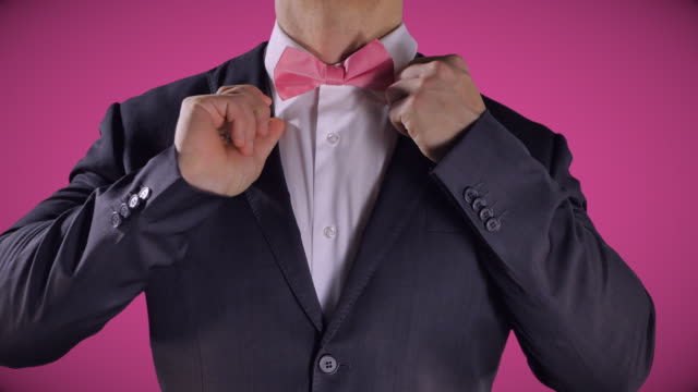 Pink-Bowtie,-Man-in-Black-Tuxedo-Suit,-Hands,-Elegant-Wedding-Fashion