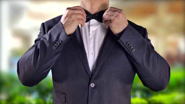 Groom-Elegant-Man-Tuxedo-Black-Bow-Tie,-Destination-Wedding,-Happy-Lifestyle