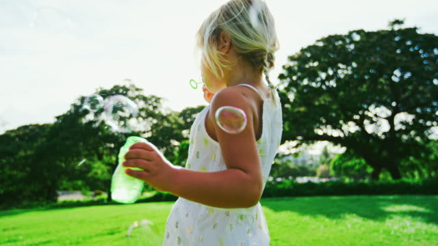 Young-Girl-Blowing-Bubbles