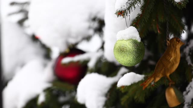 new-year-green-ball-natural-street-fir-tree-winter-snow-Moscow-city-hd-footage