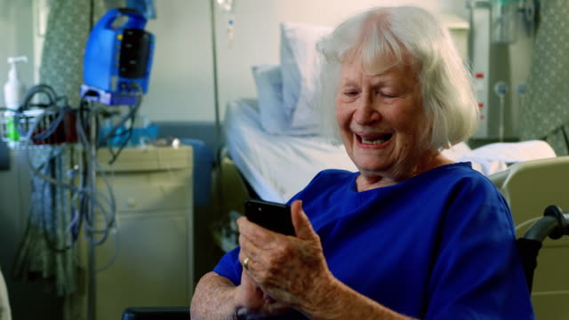 Senior-patient-using-mobile-phone-4k