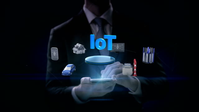 Businessman-touch-smart-phone,-mobile,-Smart-house,-Factory,-Building,-Car,-Mobile,-internet-sensor-connect-'IoT',-4k-movie.