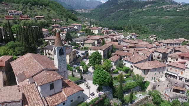 Italy.-Church-on-the-mountain-and-the-old-town.-Panorama-of-the-gorgeous-Lake-Garda-surrounded-by-mountains.-video-shooting-with-drone
