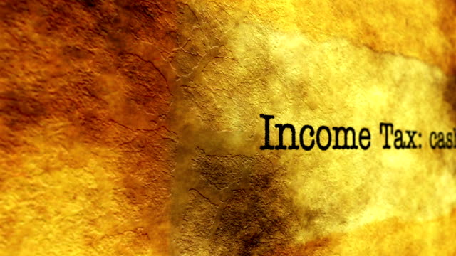 Income-tax-on-grunge-background
