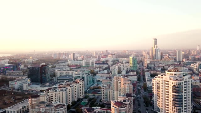Sunset-in-megapolis.-Video.-Beautiful-cityscape-with-top-view-on-skyscrapers.-Top-view-of-the-modern-city-at-sunset