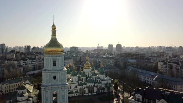 A-bird's-eye-view,-panoramic-video-from-the-drone-in-FullHD-to-the-central-bell-tower-Saint-Sophia's-Cathedral-in-the-city-Kiev,-Ukraine.