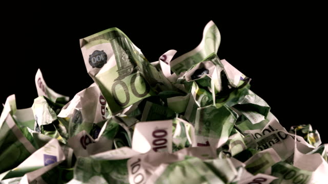 A-bunch-of-crumpled-one-hundred-Euro-banknotes-rotate