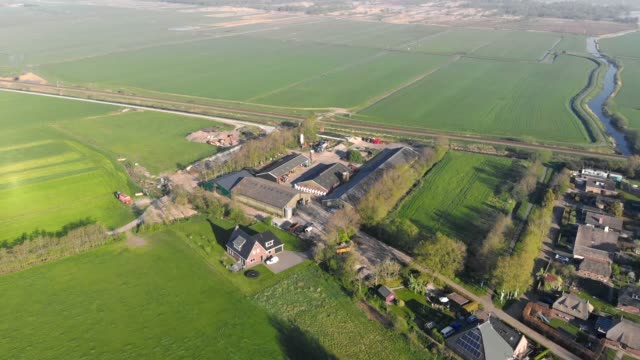 Aerial-view-small-beautiful-village-in-Holland.-Flying-over-the-roofs-of-houses-and-streets-of-a-small-village-in-Holland.