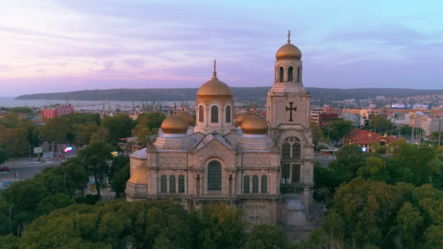 Varna-sunrise,-aerial-view-of-The-Cathedral-of-the-Assumption.-Beautiful-city-by-the-summer.