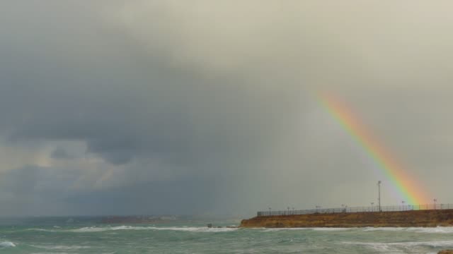 Rainbow-over-the-quay.-The-cloud-closes-the-rainbow