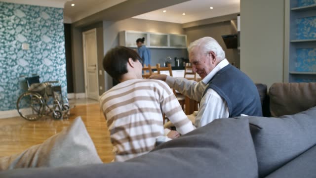 Volunteer-Caregivers-Visiting-Senior-Man